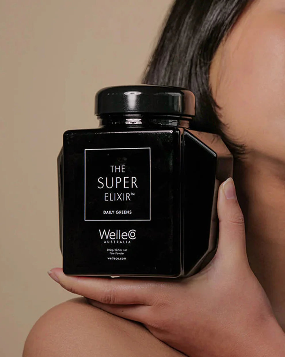 The Super Elixir Caddy -  Icónico envase, tu compañero de belleza y bienestar para toda la vida para guardar tus polvos.